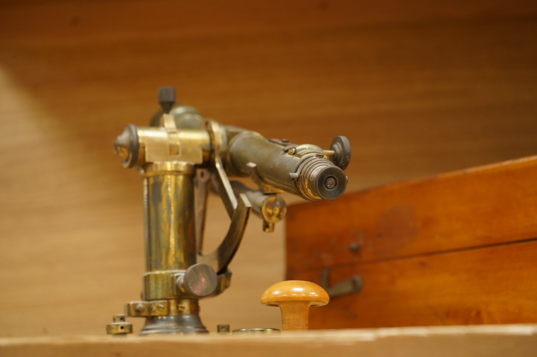 A German brass alidade by F. Sartorius, Göttingen, number 1755, 58.5cm wide, contained within a fitted birch case with applied maker’s label and other reference markings, the case; 63cm wide, 14cm high, 25cm deep at the